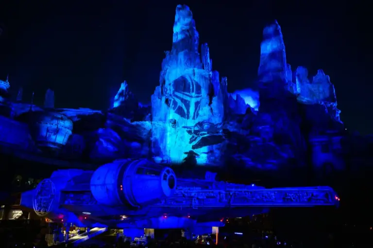 For a limited time in Star Wars: Galaxy’s Edge at Disneyland Park in Anaheim, Calif., visitors can celebrate the release of the film “Star Wars: The Mandalorian and Grogu” by catching Grogu as he tests his power to recall fond memories of his adventures with The Mandalorian in “The Curious Child,” playing after “Shadows of Memory: A Skywalker Saga.” These nightly stunning projection effects transform the spires of Batuu near the Millennium Falcon, taking you on a storytelling adventure across the galaxy. (Richard Harbaugh/Disneyland Resort)