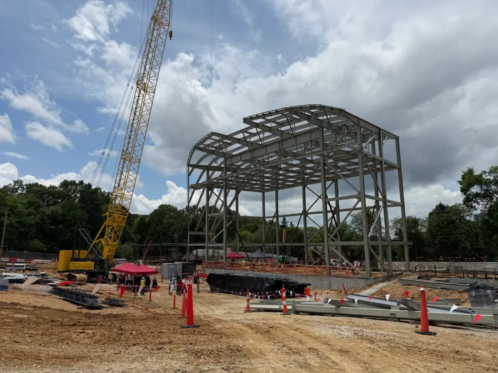 A ceremonial topping off ceremony marked a milestone in the ongoing construction of the new Red Hat Amphitheater Tuesday afternoon, which is set to be open in time for the 2027 concert season.