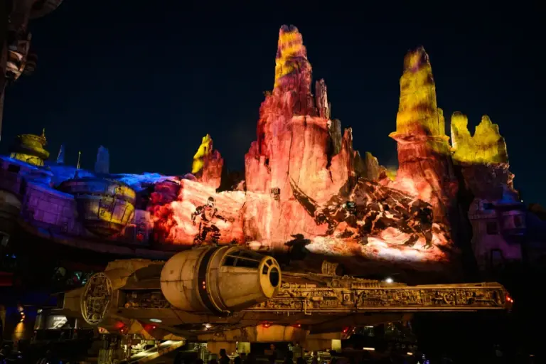For a limited time in Star Wars: Galaxy’s Edge at Disneyland Park in Anaheim, Calif., visitors can celebrate the release of the film “Star Wars: The Mandalorian and Grogu” by catching Grogu as he tests his power to recall fond memories of his adventures with The Mandalorian in “The Curious Child,” playing after “Shadows of Memory: A Skywalker Saga.” These nightly stunning projection effects transform the spires of Batuu near the Millennium Falcon, taking you on a storytelling adventure across the galaxy. (Richard Harbaugh/Disneyland Resort)
