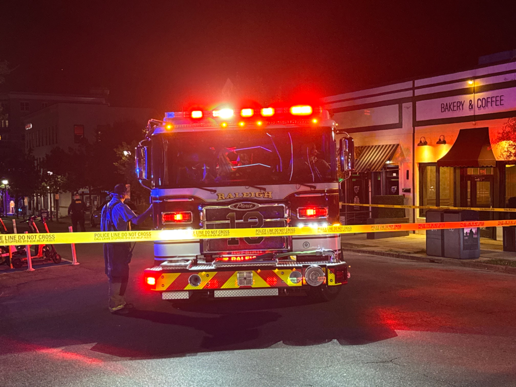 Raleigh police investigate a shooting in the 1100 block of Glenwood Avenue that hurt two people early Saturday morning. (Cole Sams)