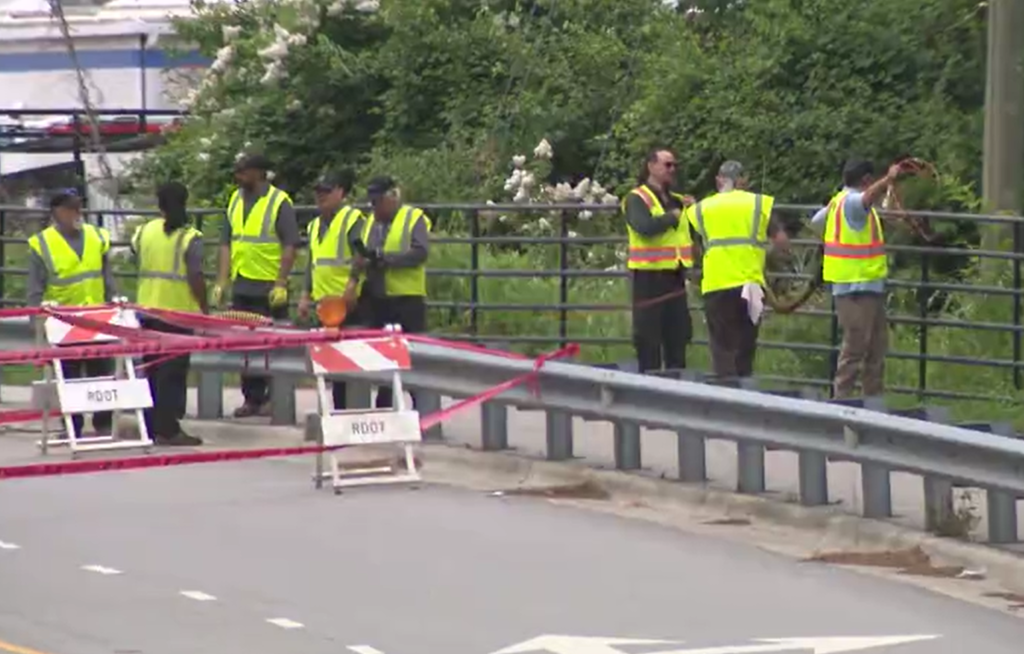 Raleigh emergency crews investigate sinkhole on Yonkers Road (Al Currie/CBS 17)