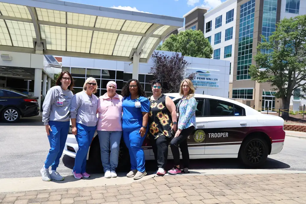 Jeff and Ginger Edwards with Cape Fear Valley Health Cancer team (Photo courtesy of Cape Fear Valley Health)