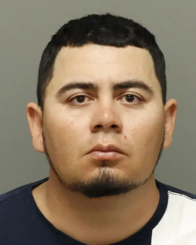 Josue Alejandro Quintanilla-Reyes is charged with murder in a road rage shooting that left Ricardo Baez Cardenas dead on Interstate 40 East near North Harrison Avenue. (Wake County Sheriff's Office)