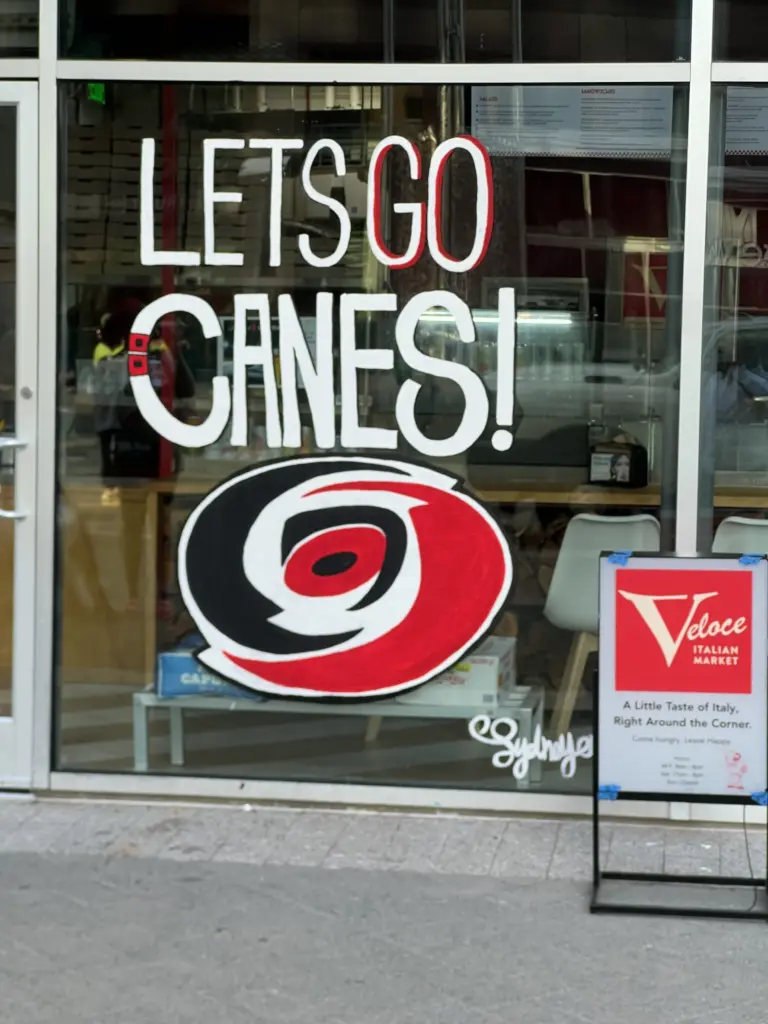 A mural celebrating the Carolina Hurricanes is painted on a window in Raleigh. (Greg Funderburg)