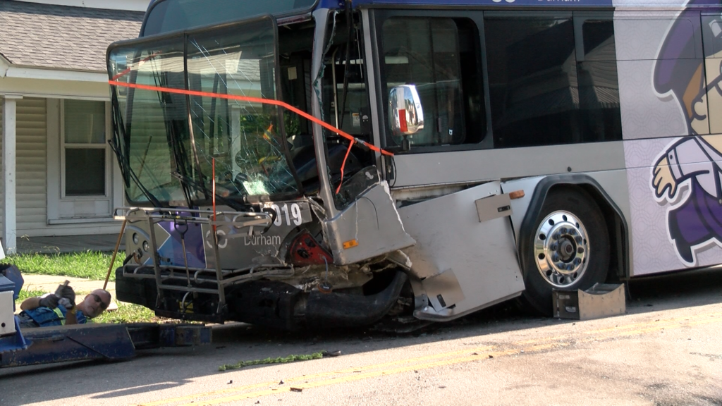 A GoDurham bus with heavy front-end damage after a crash on North Driver Street and Holloway Street. (Ben Bokun)